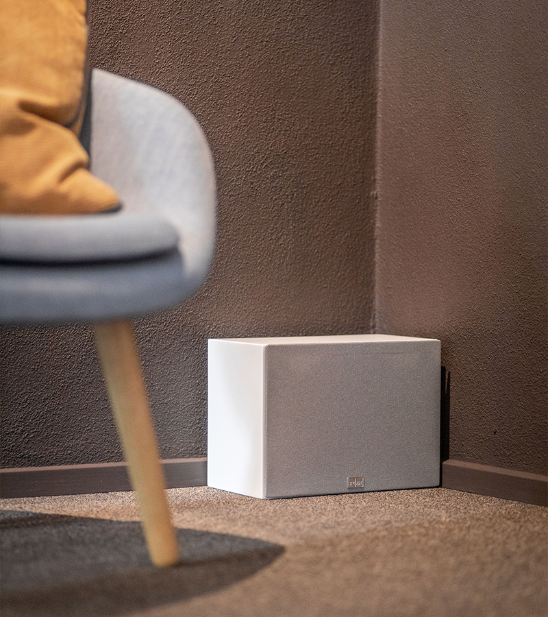 White Lyngdorf BW-3 subwoofer with grey Gabriel fabric cover