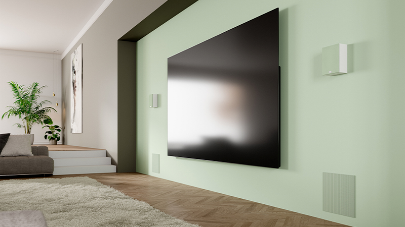 Lyngdorf DW-1 in-wall woofer and MH-2 speakers in a living room setup