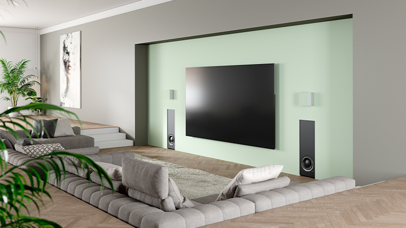 Lyngdorf DW-1 in-wall passive woofer driver visible without grille